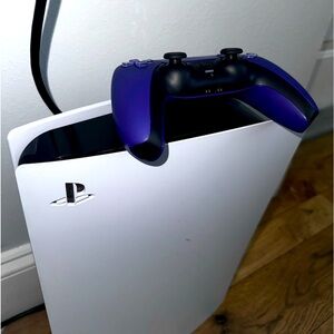PS5 with purple controller.